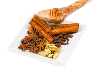 Cinnamon, cloves, cardamom, anise