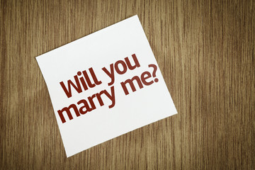 Will You Marry Me? on Paper Note on texture background
