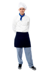Young male chef posing casually