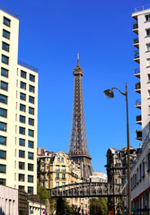 View on Eiffel Tower on urban street in Paris, France