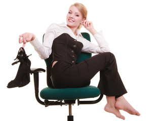 Break from work. Businesswoman relaxing on chair.