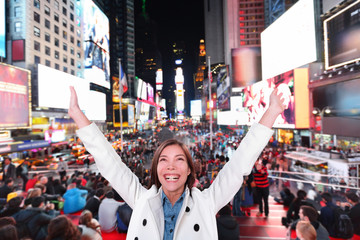 Happy excited woman in New York, Times Square