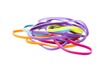 Colorful rubber bands on white background