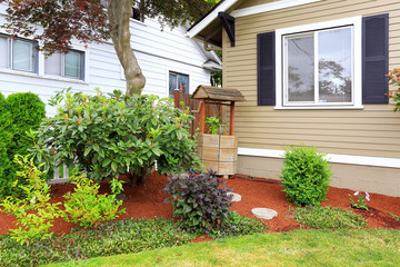 Decorated draw well on front yard.