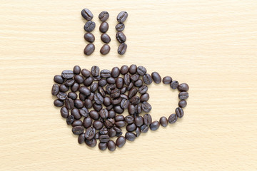 coffee beans Placed in coffee cup shape.