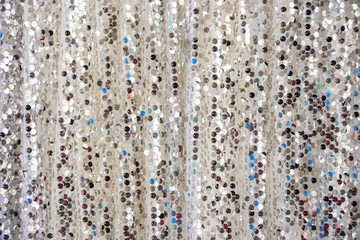Fabric curtain decorated with circle metal plate