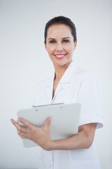 Doctor taking down medical notes