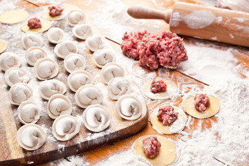 Fototapeta na wymiar Dumplings. Cooking process.