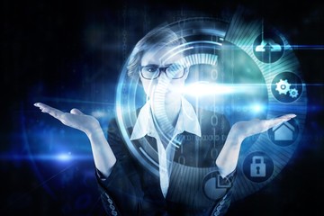 Businesswoman holding hand out in presentation