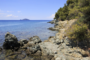 Fototapeta na wymiar Rocky coast of the Aegean Sea.