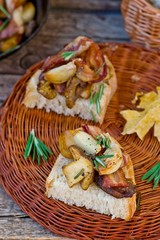 Fried cepes with bacon, garlic and rosemary