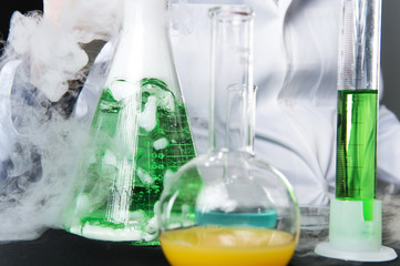 closeup on chemical studies in laboratory and flasks.