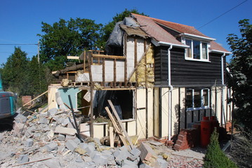 Fototapeta na wymiar Demolition of the side of a house.