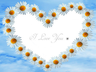 heart frame with daisy flowers and blue sky