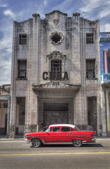 Fototapeta na wymiar Classic american red car in Old Havana, Cuba