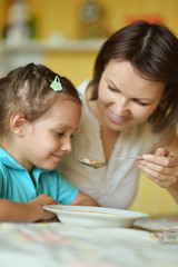 Little girl with mother