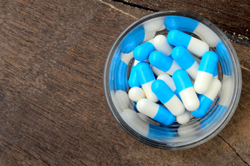 medicine capsule pill in glass