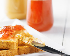 Toasts with peanut butter and strawberry jam
