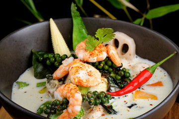 Traditional thai green curry with shrimps