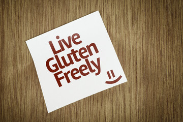 Live Gluten Freely on Paper Note on texture background