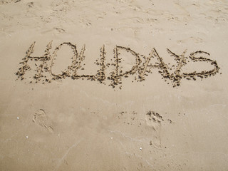 escrito vacaciones en playa