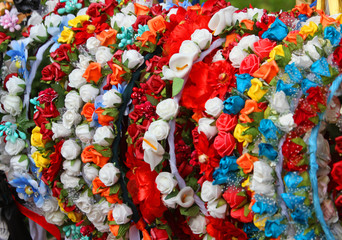 Fototapeta na wymiar garlands and wreaths of flowers to decorate the head and hair of