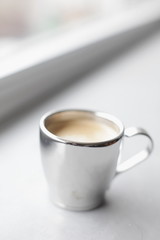 Espresso pouring into a cup