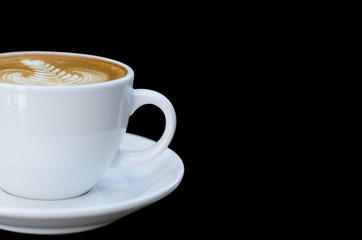 white cup of coffee isolated on black background