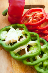 sliced colourful paprika peppers on the table