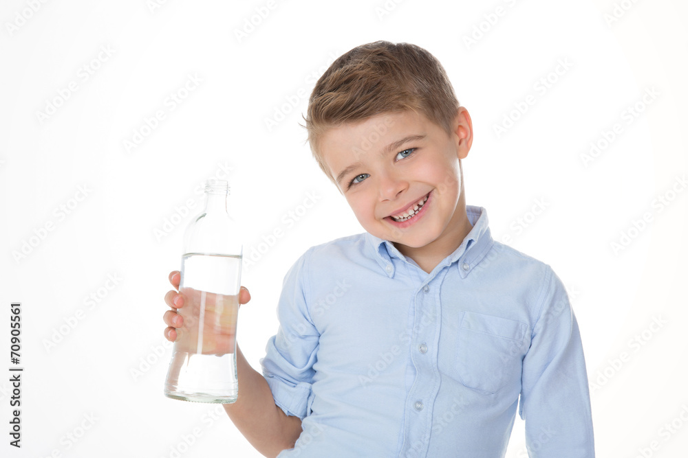 Wall mural child shows a bottle