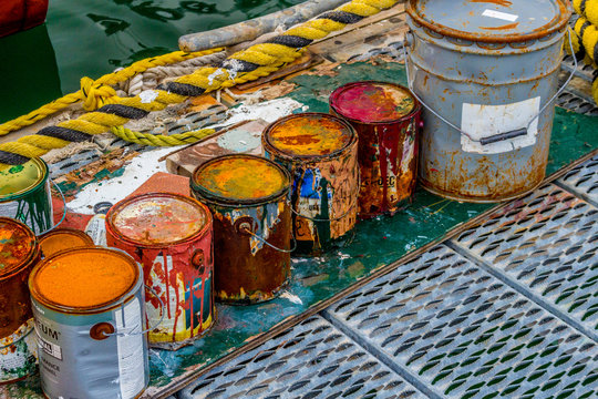 Colorful paint cans on the docks