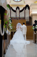 bride and groom in wedding ceremony