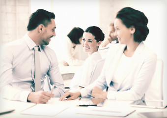business team discussing something in office