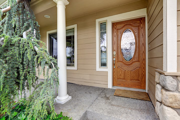 Wooden entrance door with glass trim