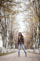 Young woman at autumn park