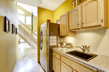Small kitchen area with moden cabinets