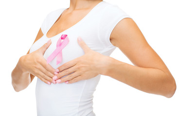 woman with pink cancer awareness ribbon