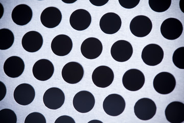 Metal background with holes