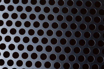 Metal background with holes