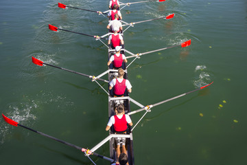 Crew Team in Competition, Rowers in eight-oar rowing boats on the tranquil lake