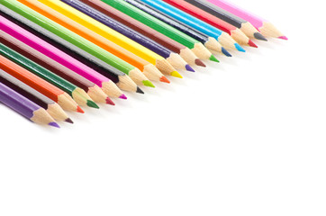 Colour pencils isolated on white background close up