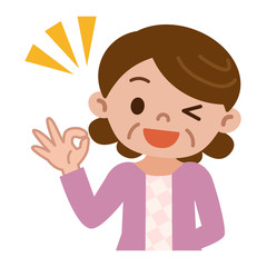 OKサインの中高年女性