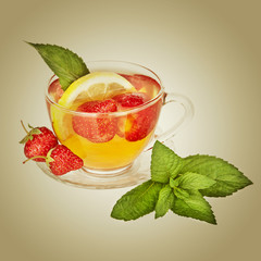 Tea cup with strawberry and mint leaf