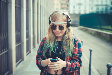beautiful young blonde hair woman hipster listening music