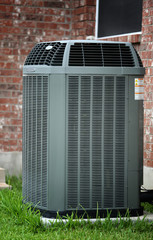 High efficiency air conditioner on brick wall background