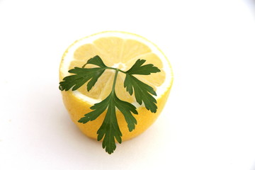 Lemon and parsley on plate
