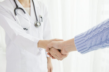 Doctors and patients are shaking hands