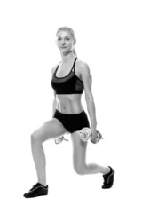 Fototapeta na wymiar Sexy and fit woman lifting hand weights