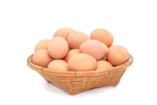 eggs  in the basket on white background