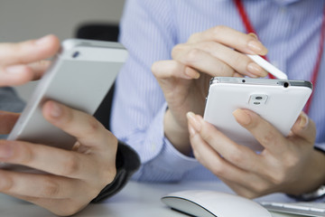 Women that use the stylus pen for mobile phone